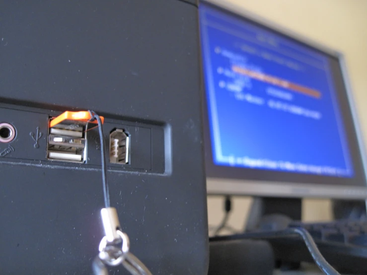 the power cable has been inserted from the computer monitor