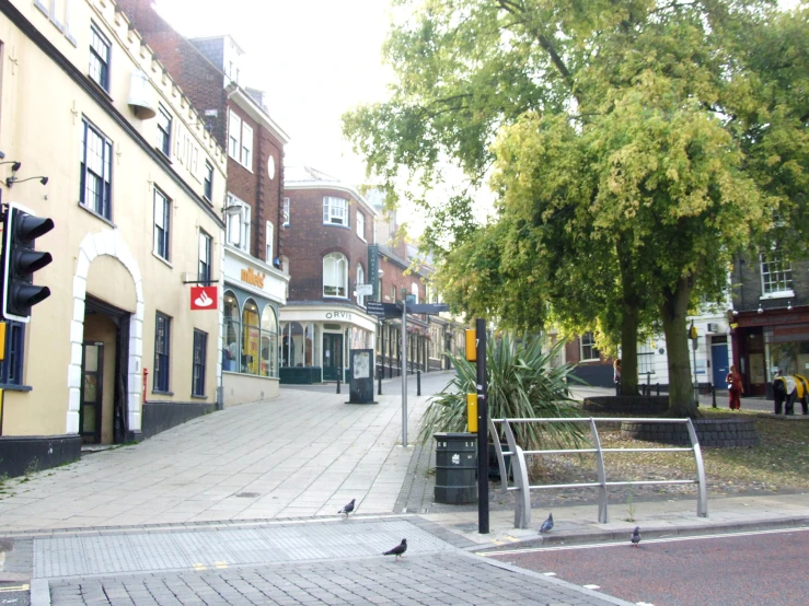 a couple of buildings on a street side