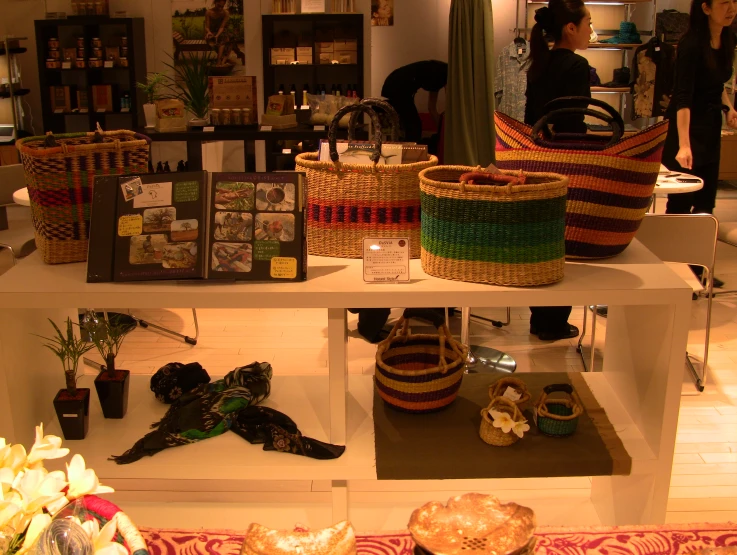 many baskets and baskets on display in a store