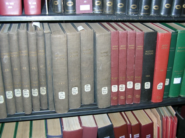 a bookcase with a variety of books next to it