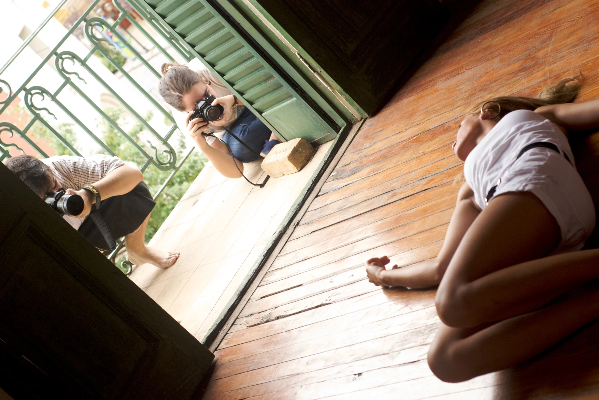 a woman taking a picture of herself with her camera