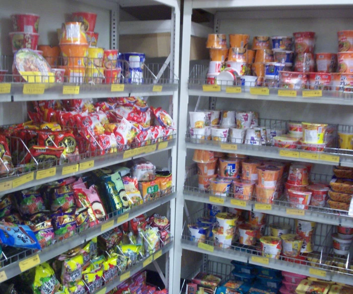 several shelves with different kinds and colors of food