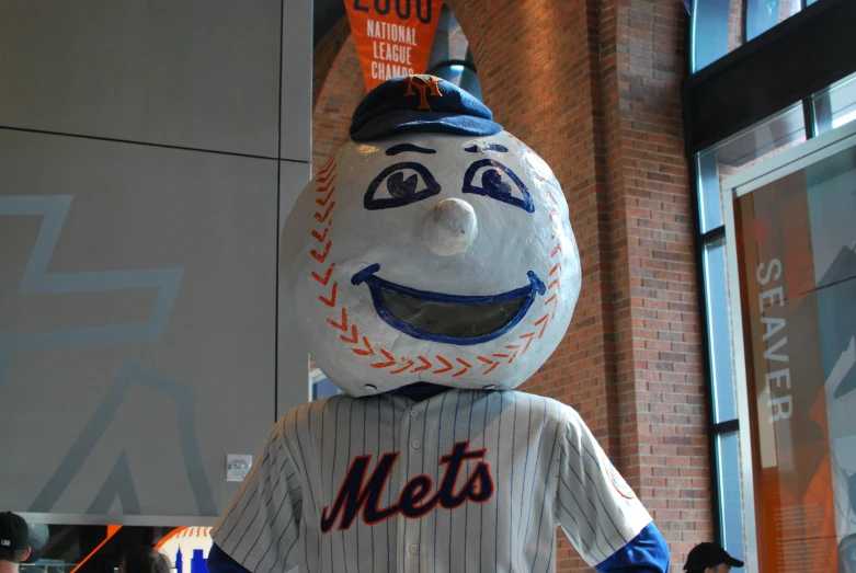 a baseball jersey with a face that is wearing a baseball cap