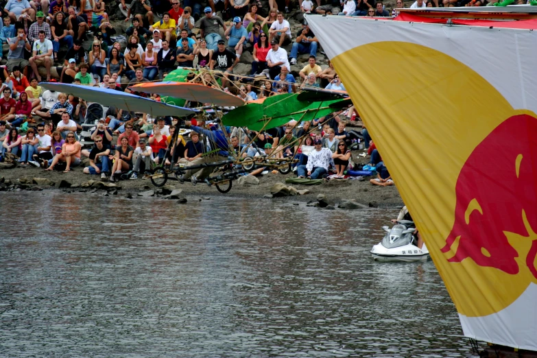 an image of a large crowd at a water event