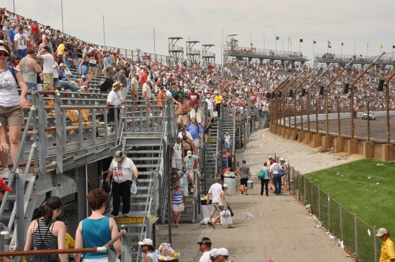 the crowded stands of an open stadium with spectators