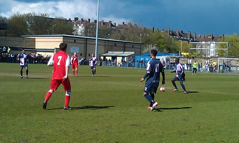 the soccer teams are competing in a match