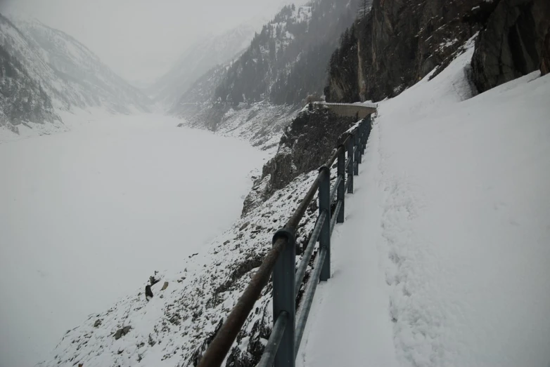 a long rail is on the side of a mountain