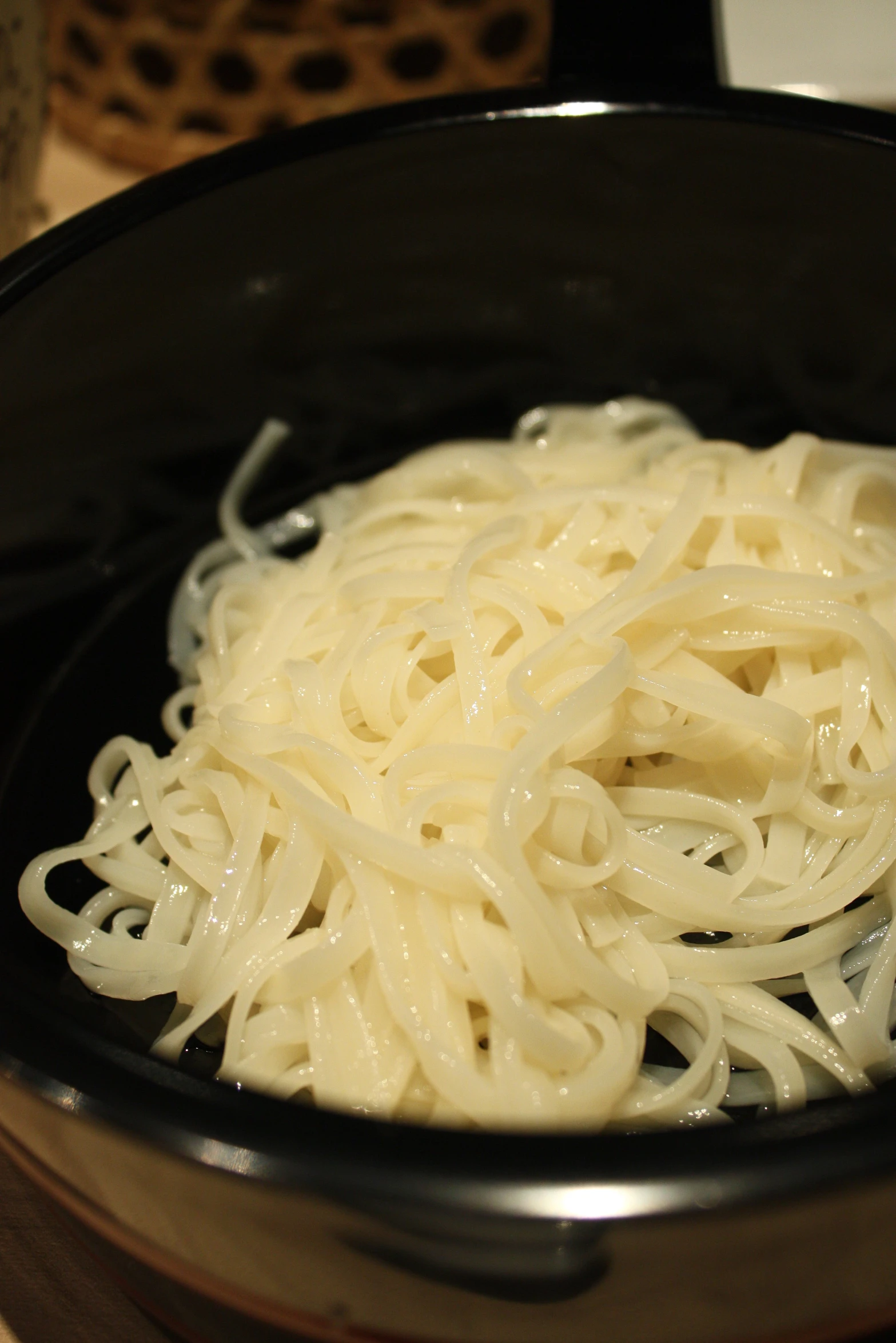 a pasta dish is sitting in the crock pot