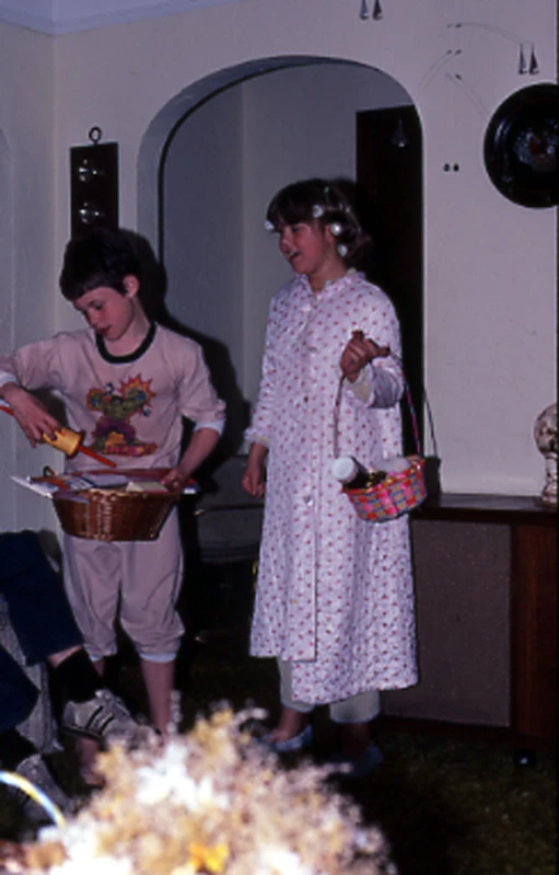 children gathered together in a room for a party