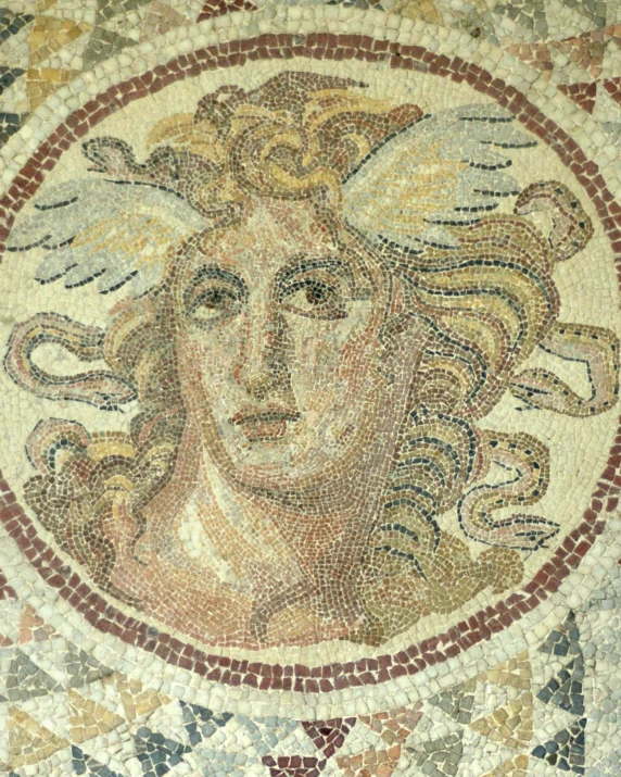 a large mosaic depicting an angel with wings