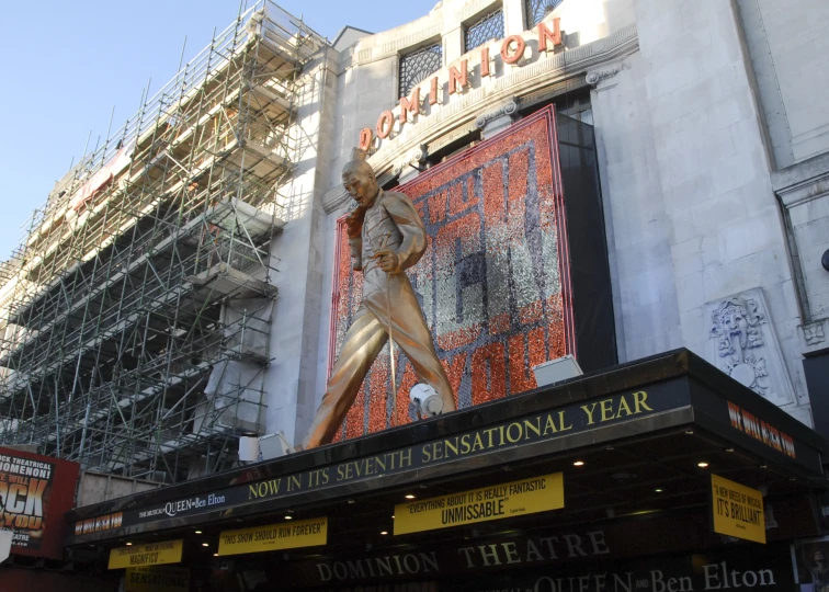 a building with a large sculpture on the corner