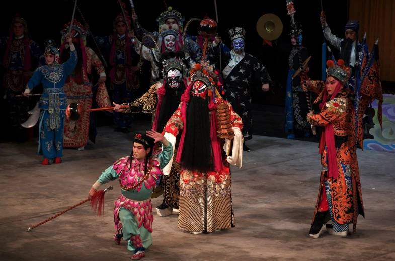 a group of men dressed in brightly colored costumes,