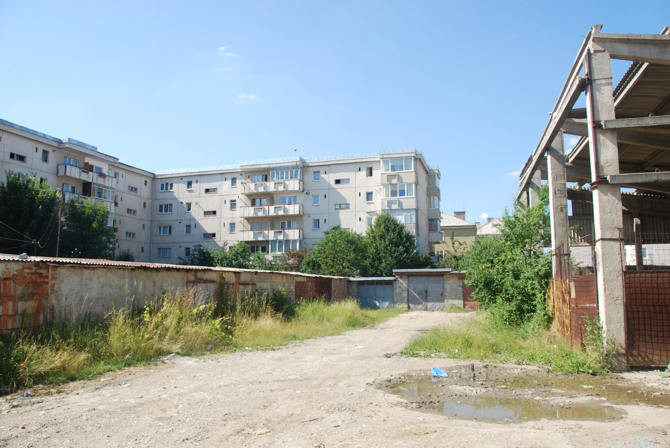 the old abandoned cars are parked in an abandoned lot