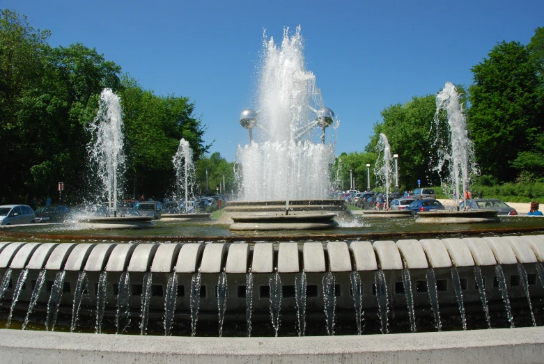a large fountain with fountains in the middle