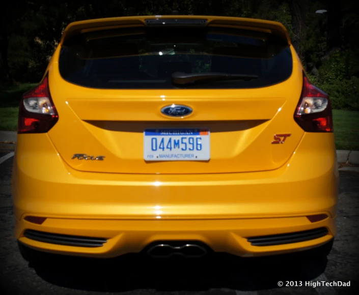 an image of a yellow subarunt with a license plate