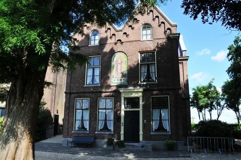 a large house that has several windows in it