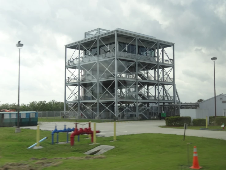 a tall building with three levels in front