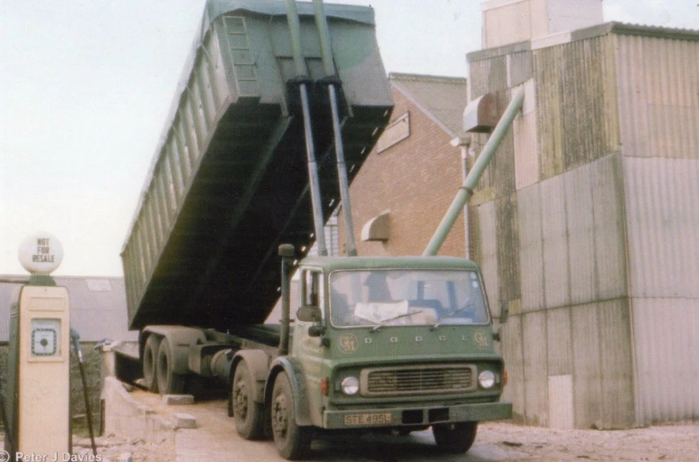 a truck is sitting near a loading area