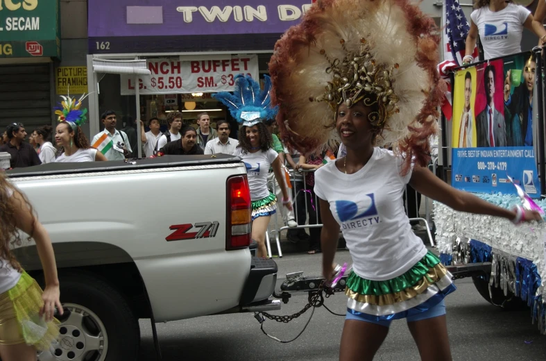 some women and one is dressed in costumes