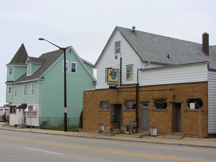 old buildings on a small town street near an empty street