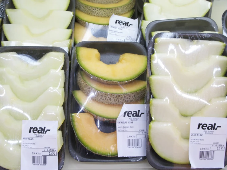 plastic containers full of fresh fruits and vegetables