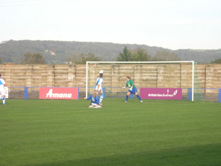 a group of young men playing a game of soccer