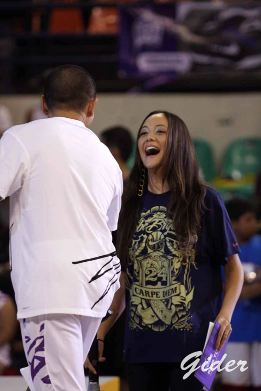 the basketball player is laughing in the court