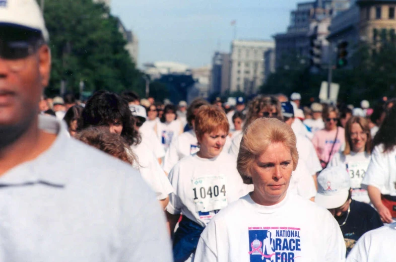 many people are walking in a large group