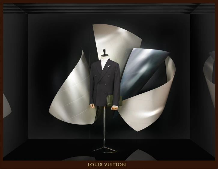 an exhibit with a suit and tie inside a large, black box