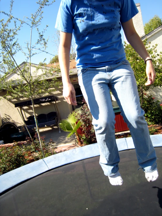 a person that is jumping on a trampoline