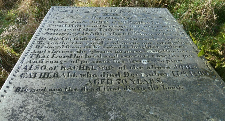 a monument with several writings written on it