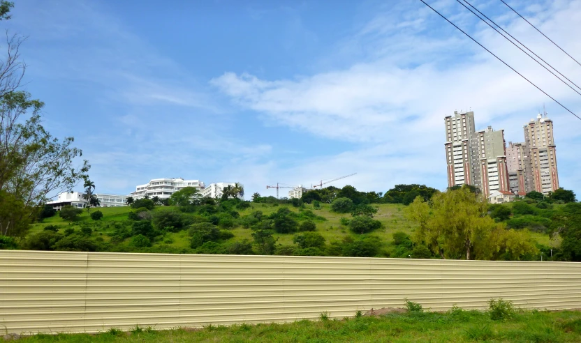 the building is next to the very tall skyscrs