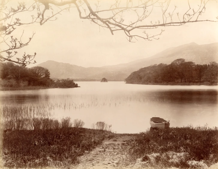 an old po of a lake with some rocks in it