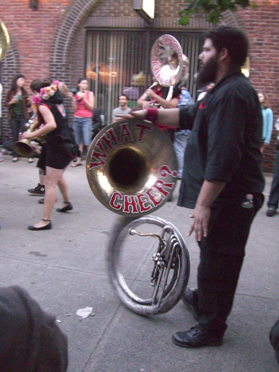 a man is playing on an old fashioned musical instrument