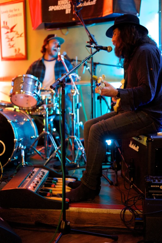 a man is playing music on his musical instrument