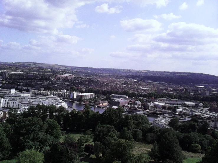 a view of a river in a city on a hill