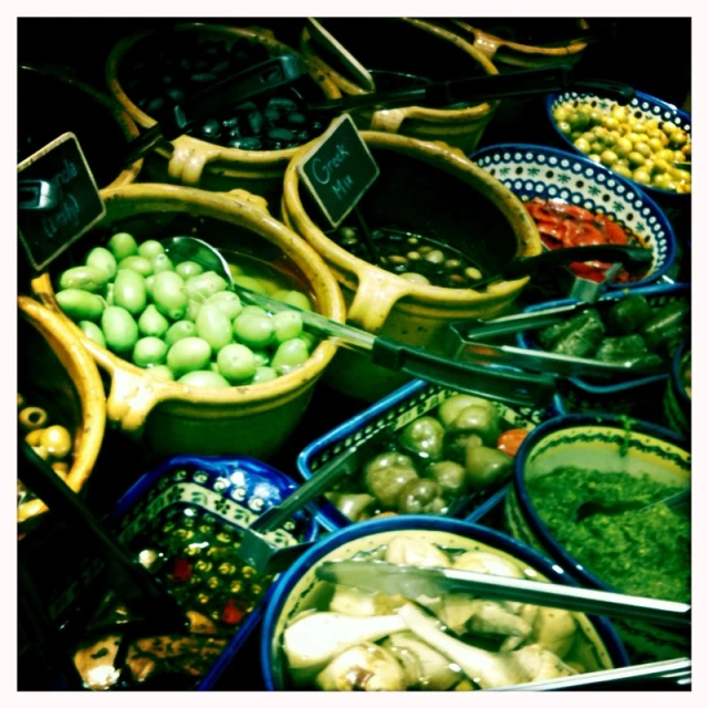 assortment of fruit in baskets and bowls all well organized