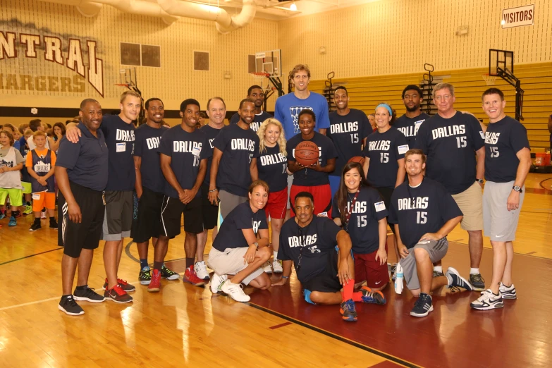 a large group of people standing next to each other