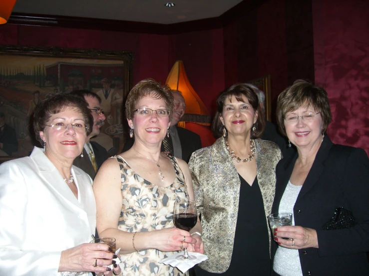 a group of women pose for the camera