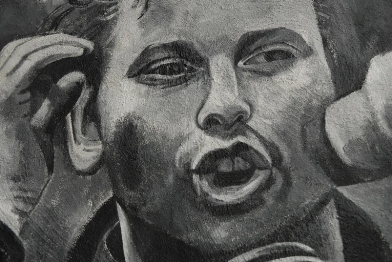a charcoal drawing of elvis presley, screaming