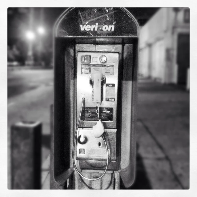 a black and white po of an old parking meter