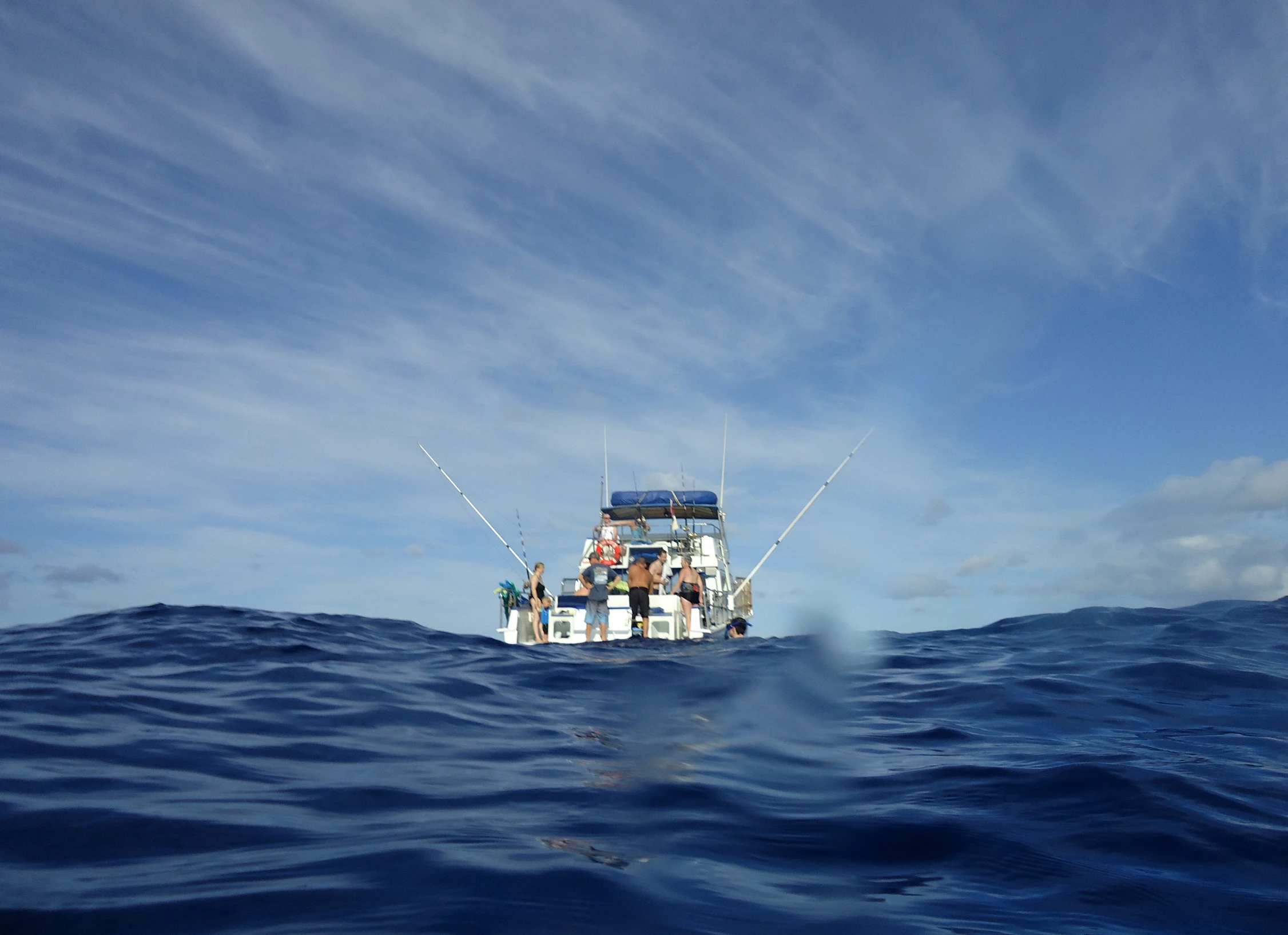 there is a boat that is in the middle of the ocean