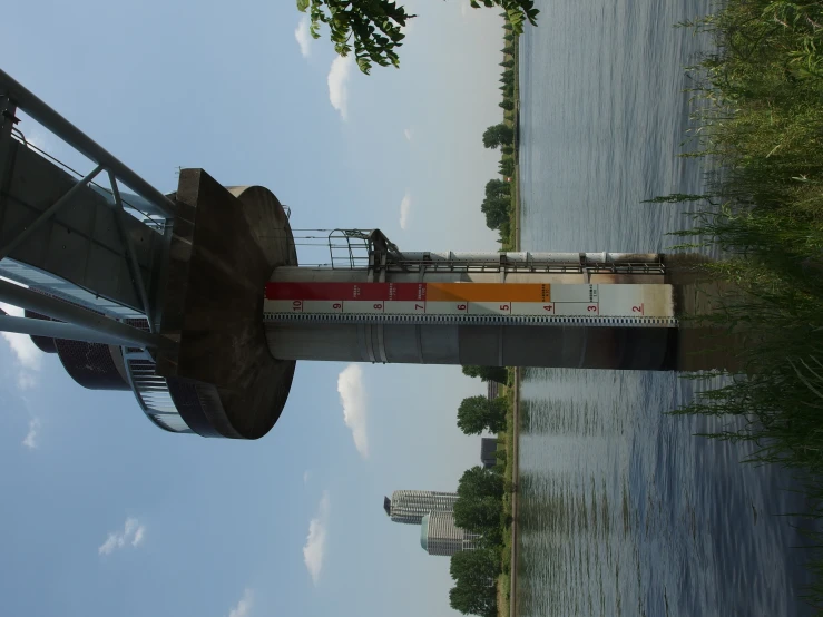 an overpass with a spiral staircase over it and other water features