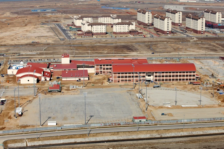 an aerial view of buildings under construction near the outskirts