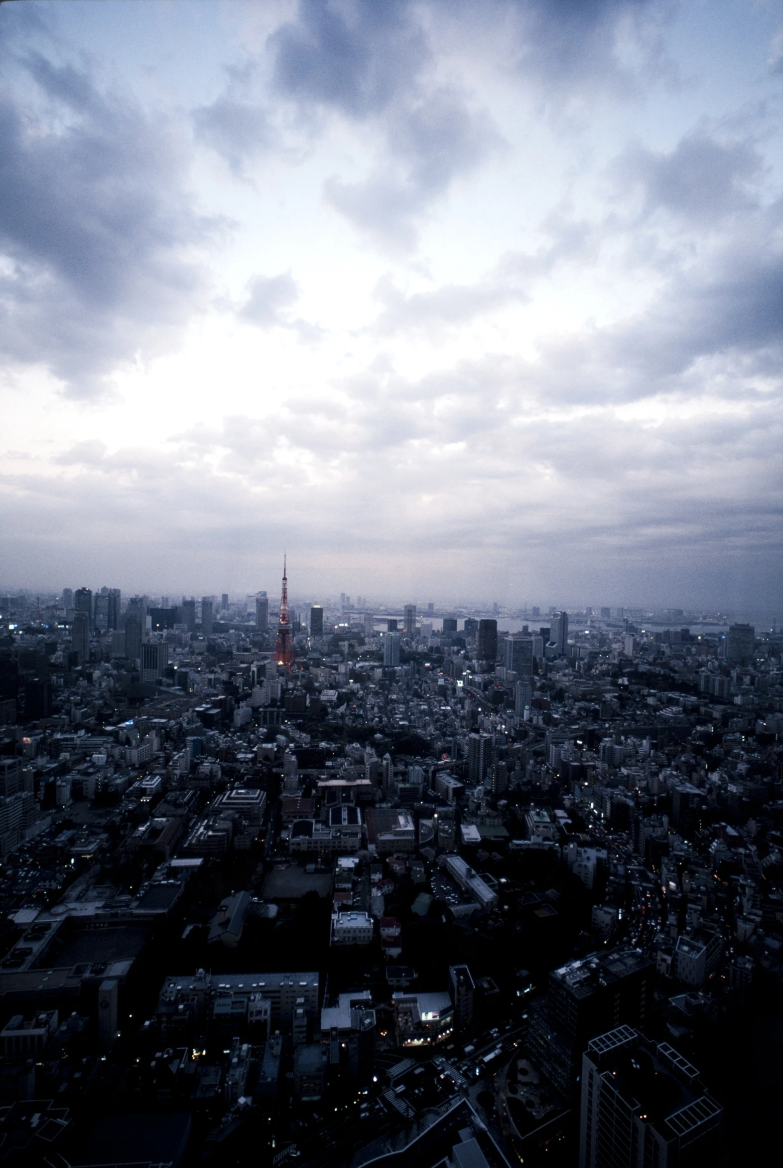 a po taken from above of city buildings at dusk