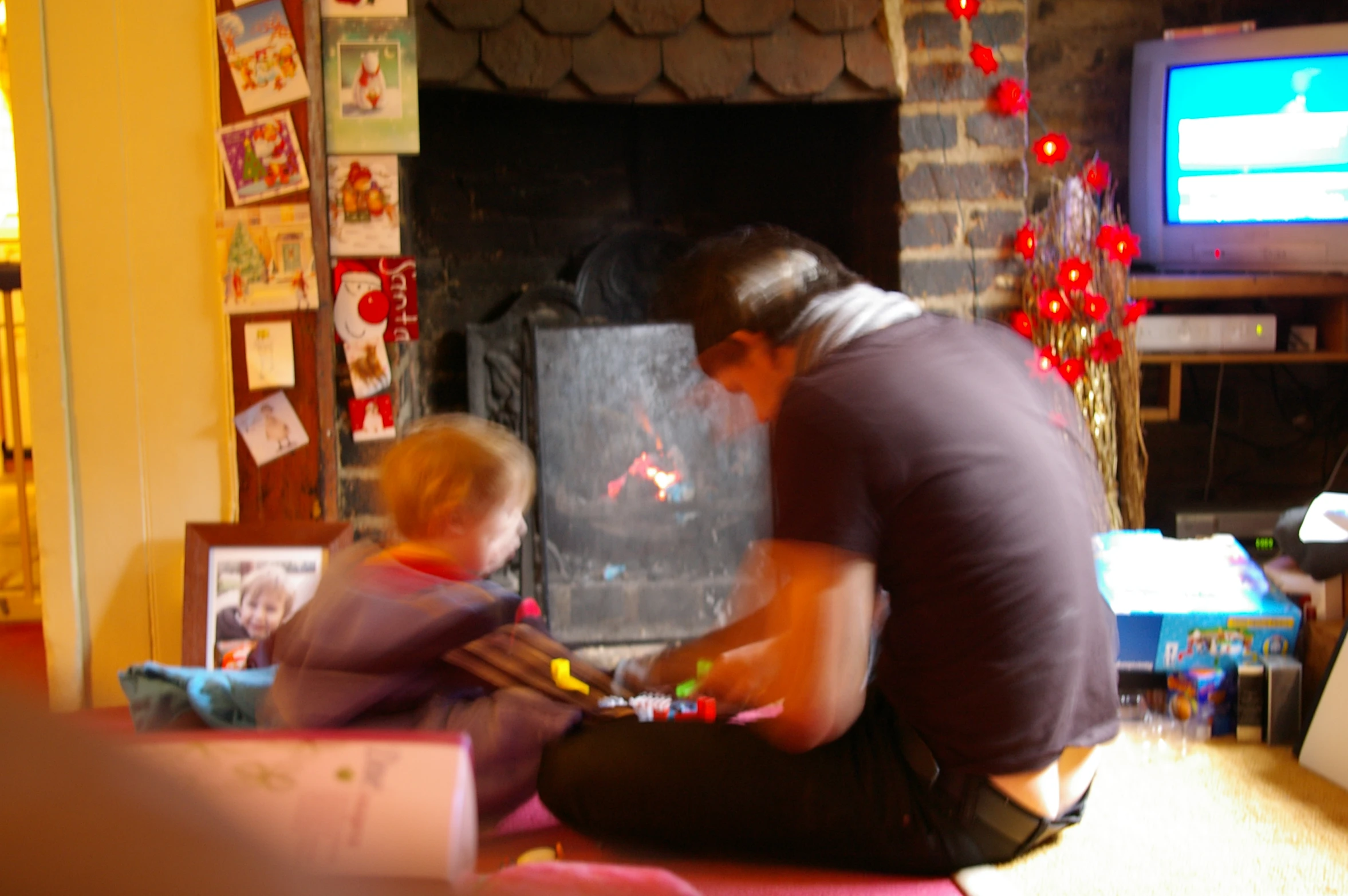 a man sitting on the ground holding a 