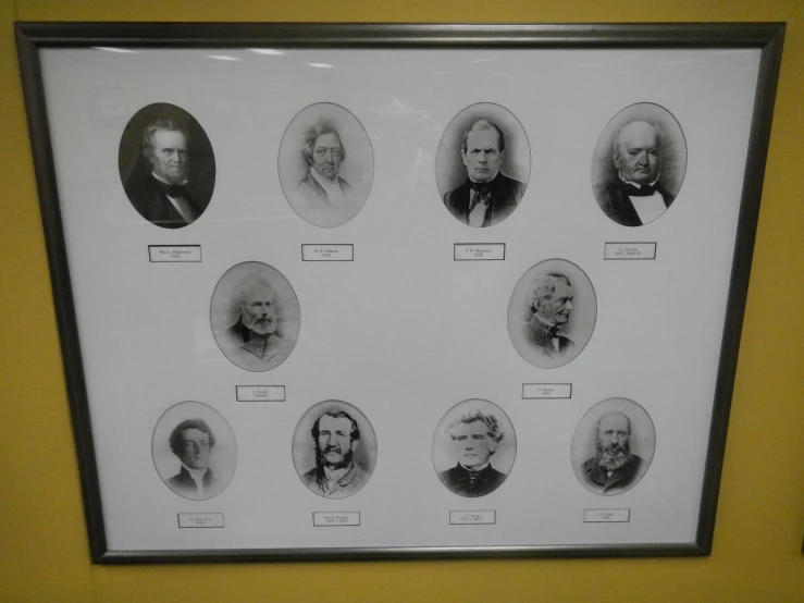 framed pictures on the wall displaying an image of presidents