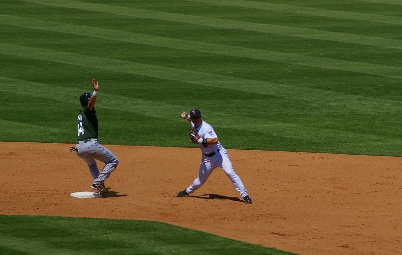 two players in action on a baseball field