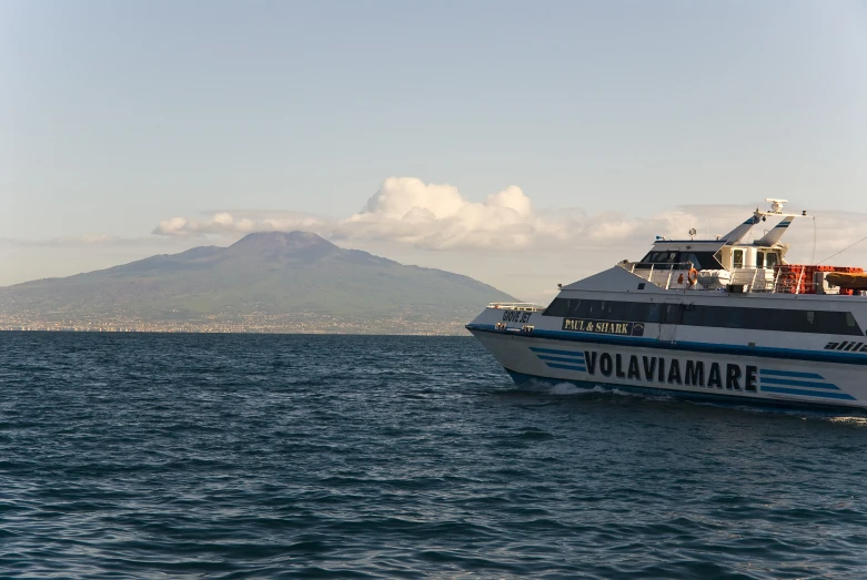 a big boat with the name vollauamaire on it floating through the water