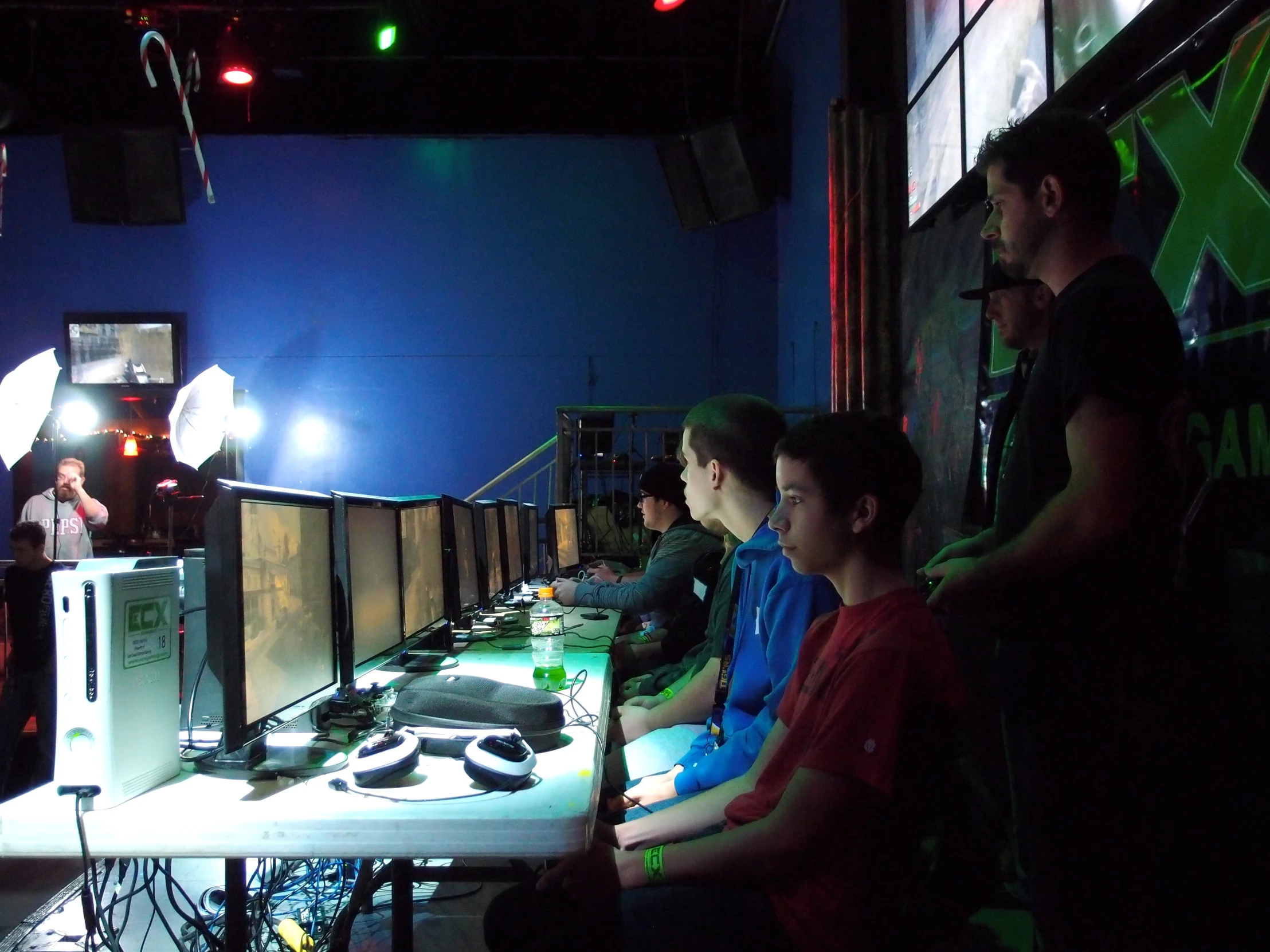 a bunch of people sitting at computer screens